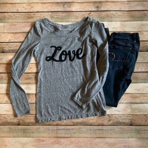 Long sleeved heather gray form fitting shirt